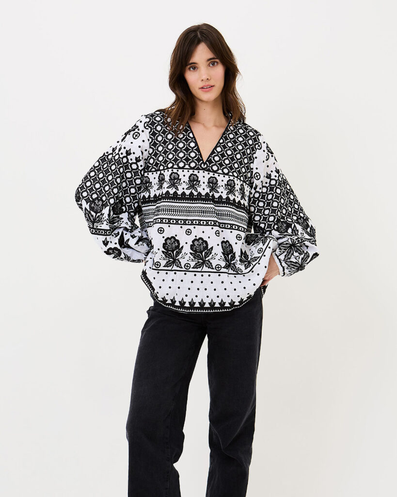 Trousers with a trendy blouse