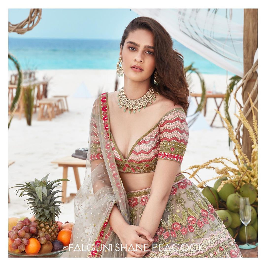 This multicolored Falguni Shane Peacock Indian Lehenga is everything you need for an intimate Mehendi shindig