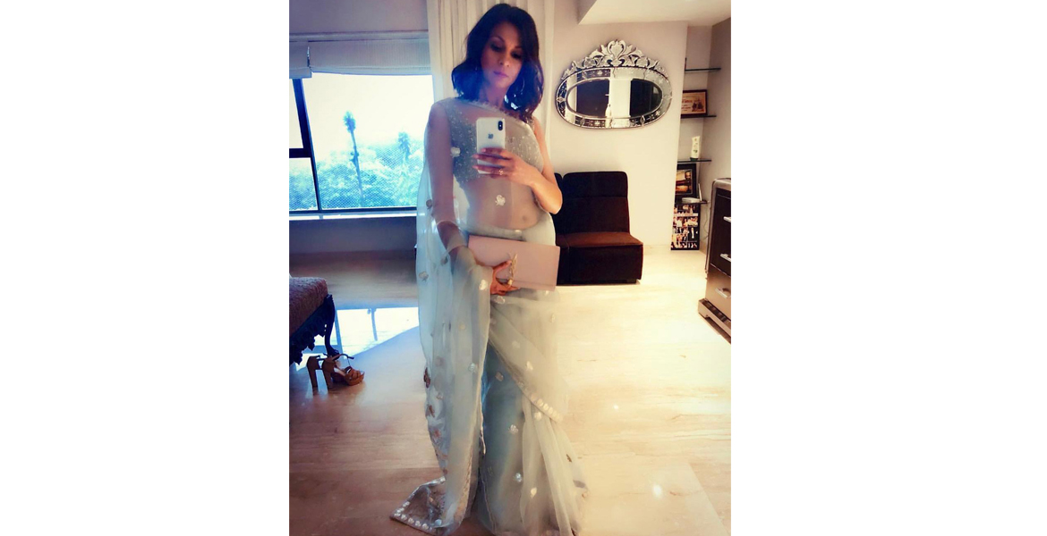 Anjula Acharia picked this sky blue, sheer Falguni Shane Peacock saree
