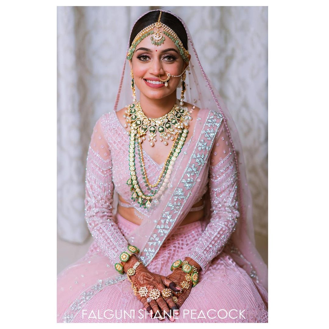 The light pink Lehenga by Falguni Shane Peacock