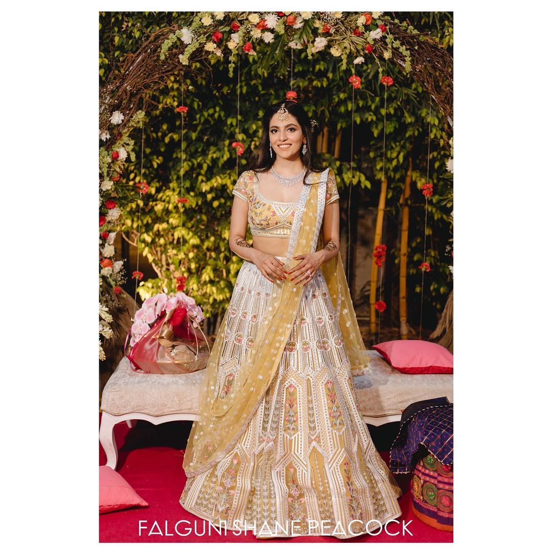 Falguni Shane Peacock bride Arsha Chopra Soni picked a pale yellow Lehenga