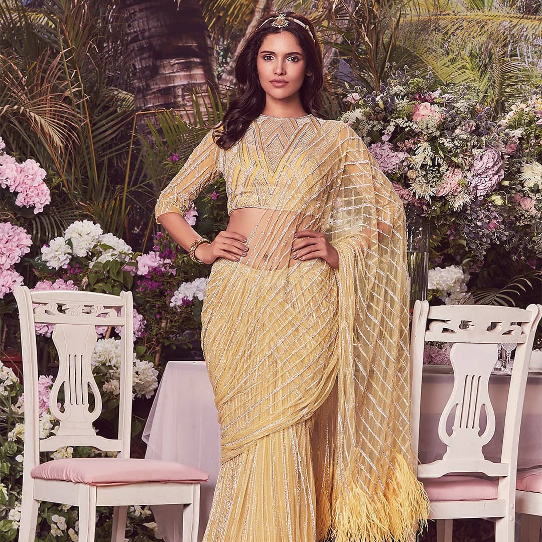 A tuscan yellow Falguni Shane Peacock saree