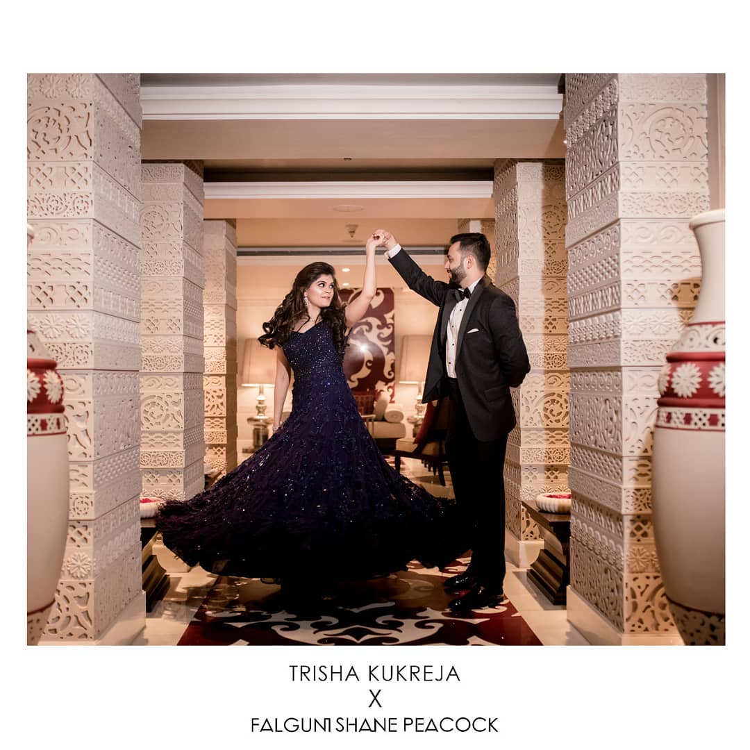 Falguni Shane Peacock bride picked an ornate, blue evening wedding gown for women