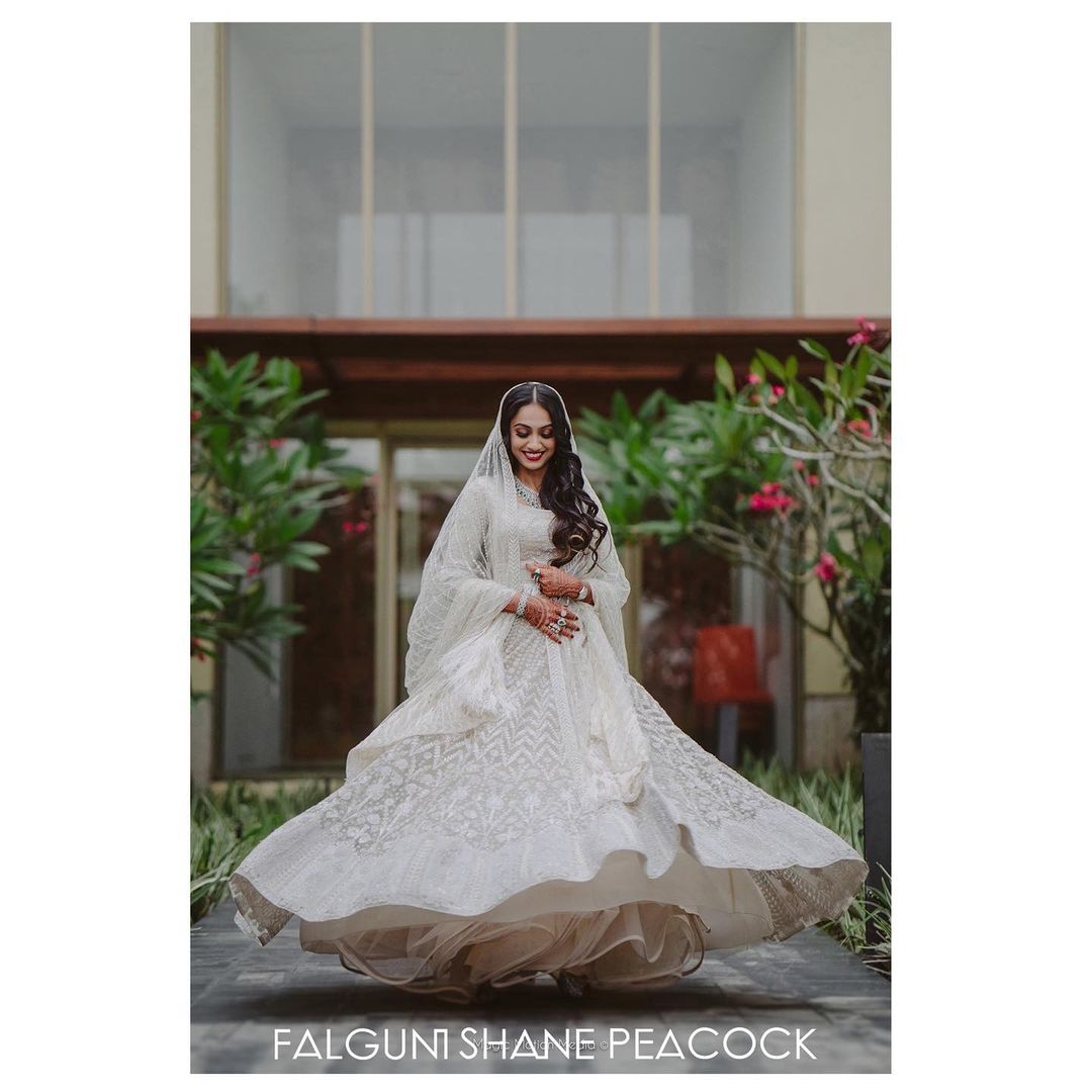ivory Lehenga by Falguni Shane Peacock for her day wedding