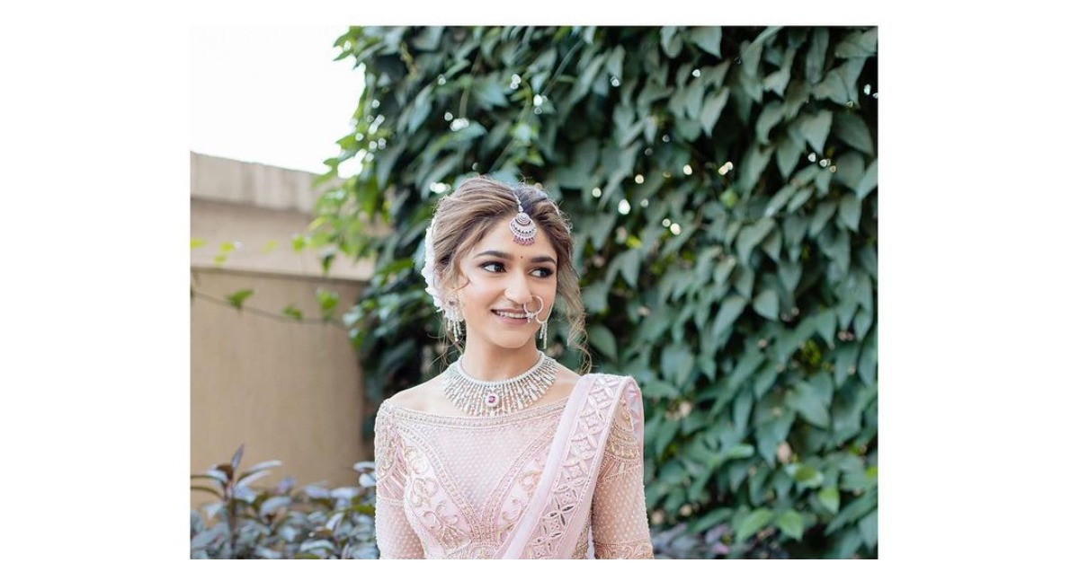 FSP bride Diksha Patel made a vision of a bride in the light pink Falguni Shane Peacock Lehenga