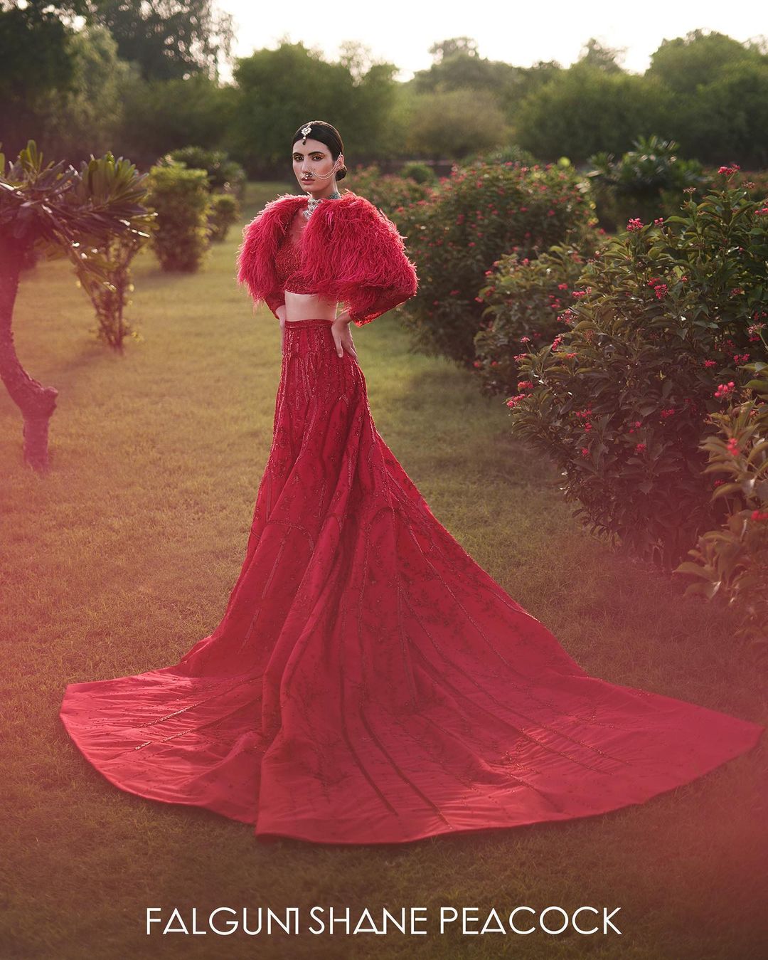 Blazing, long trail Lehengas, crystal veils, and dramatic