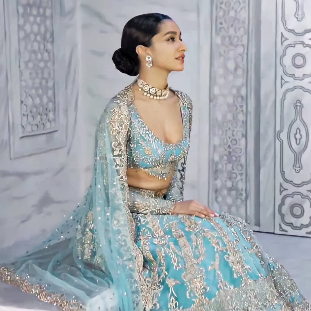 The star turned heads in a turquoise blue Indian Lehenga