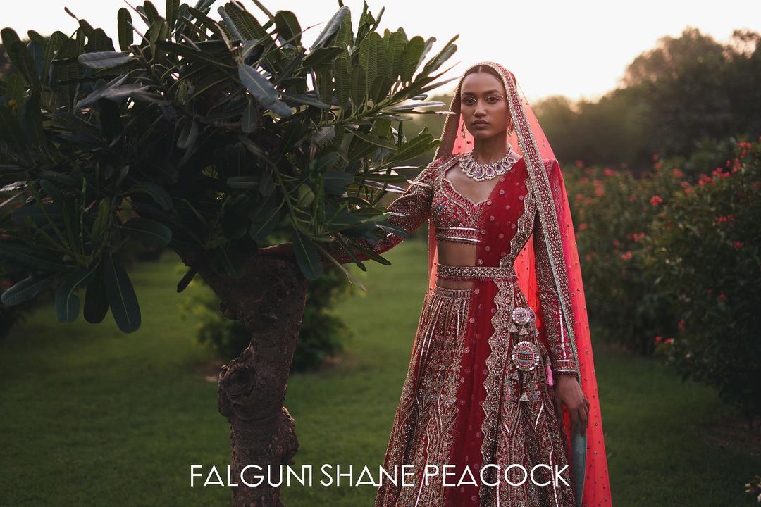 The crimson-based, multicolored Falguni Shane Peacock Lehenga