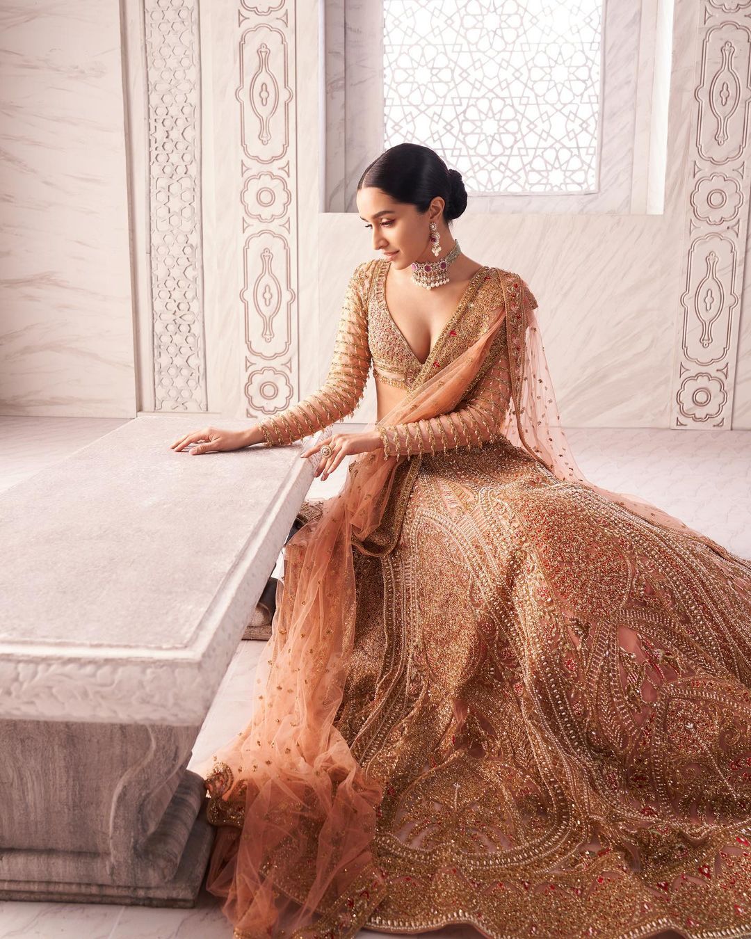 Shraddha Kapoor in an English rose pink Lehenga by Falguni Shane Peacock