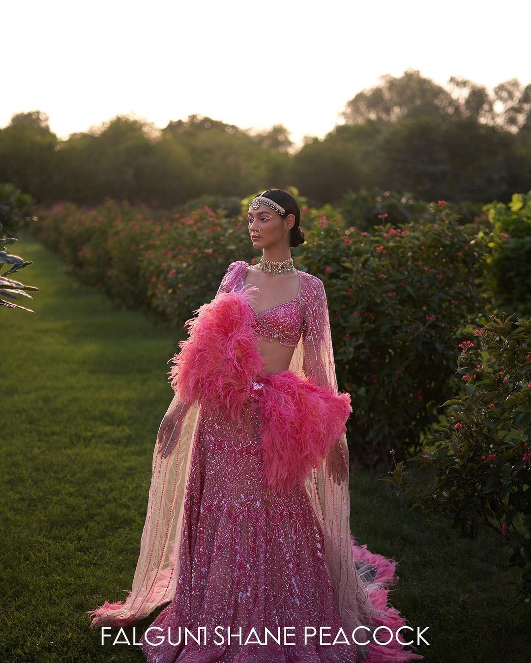 Bubble pink Lehenga is accentuated with an elaborate