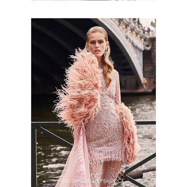 look entailed an asymmetrical short dress