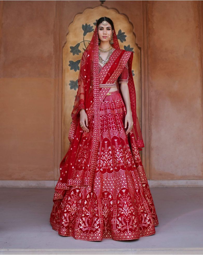 red chrome appplique designer Lehenga set by Falguni Shane Peacock