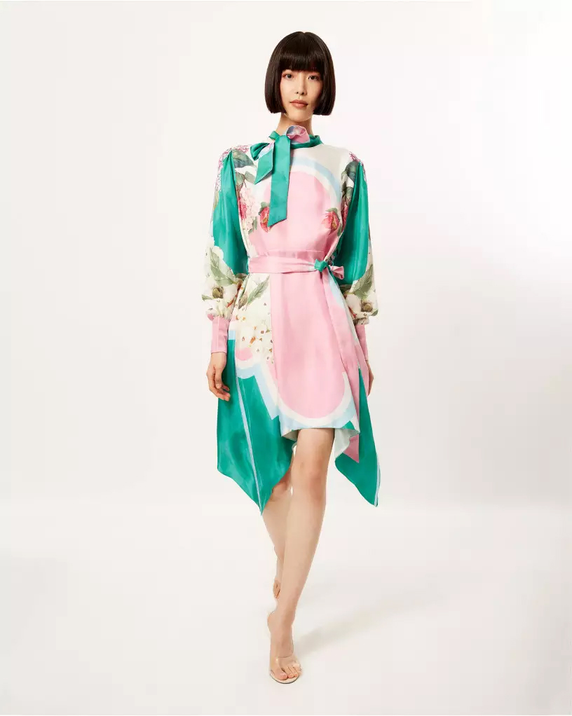 A midi dress sets the tone for glamour and comfort like no other. Relaxed silhouette, featuring a plunging neckline, puffed sleeve detailing and a waist-tie up is just the outfit a night so special deserves. Complete the look with hoop earrings and elegant heels to lead the crowd.