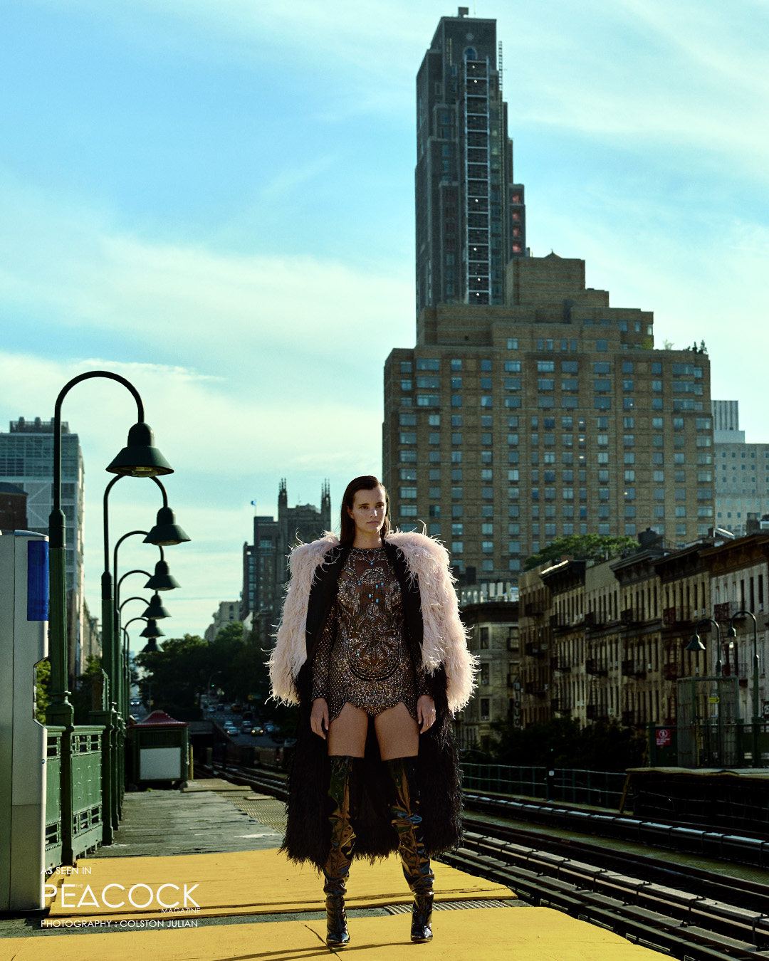 Black bodysuit with a black feathered