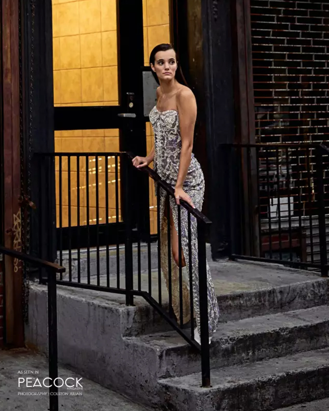 Off-shoulder fitted gown with a thigh-high slit