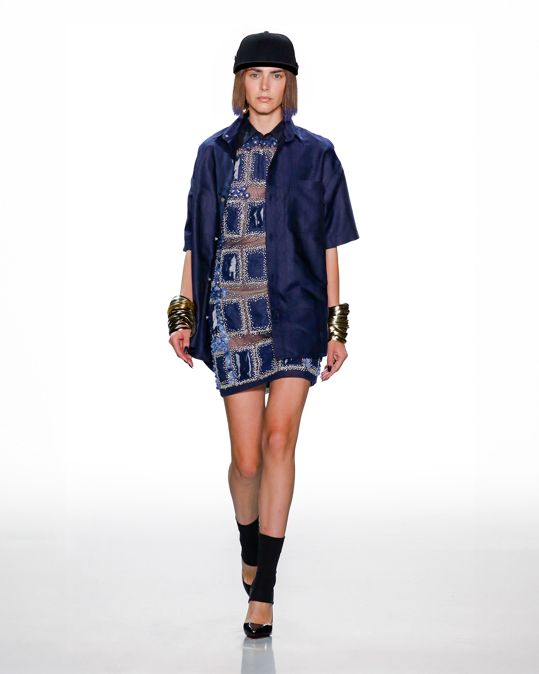 Blue-cut-out-dress-with-a-monogrammed-shirt