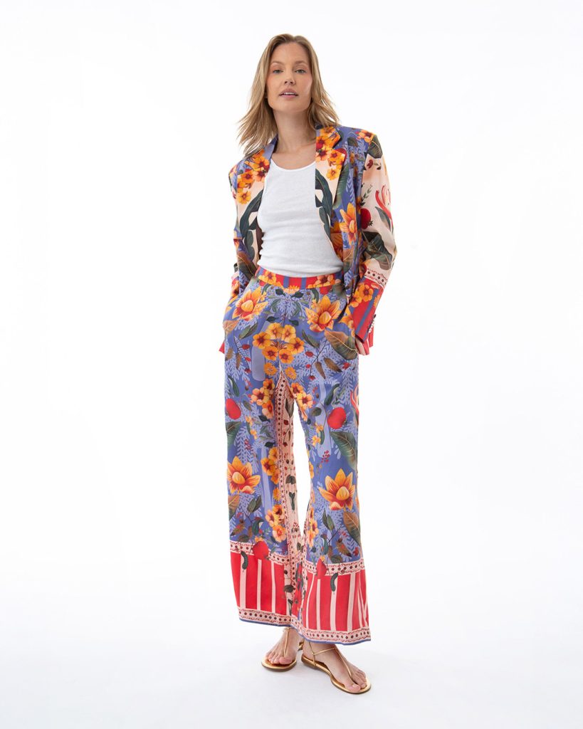 Woman in floral printed blazer and wide-leg trousers set