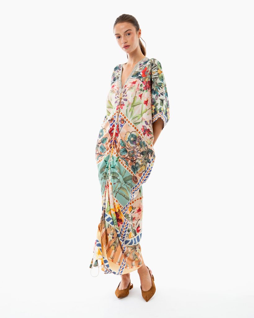 Model wearing a colorful printed designer kaftan for festive bohemian occasion wear