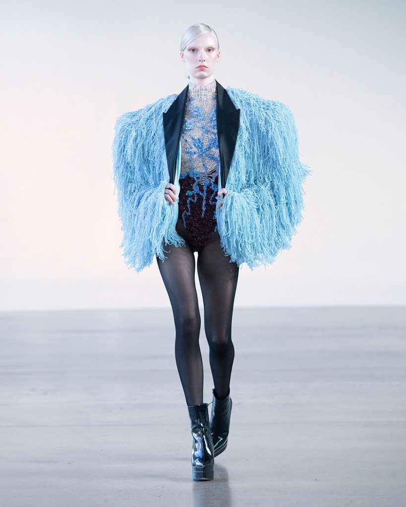 Multicoloured bodysuit with powder blue jacket